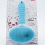 Self cleaning slicker brush